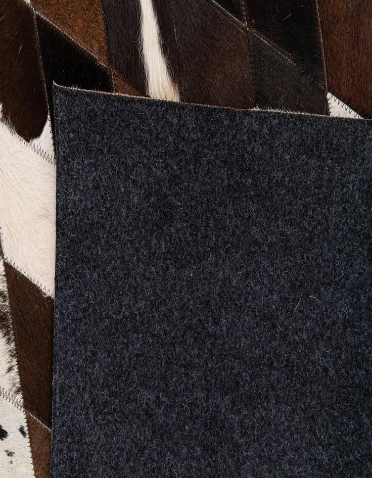 Detail image of  5' 2 x 8' 2 Cowhide Stocks Rug