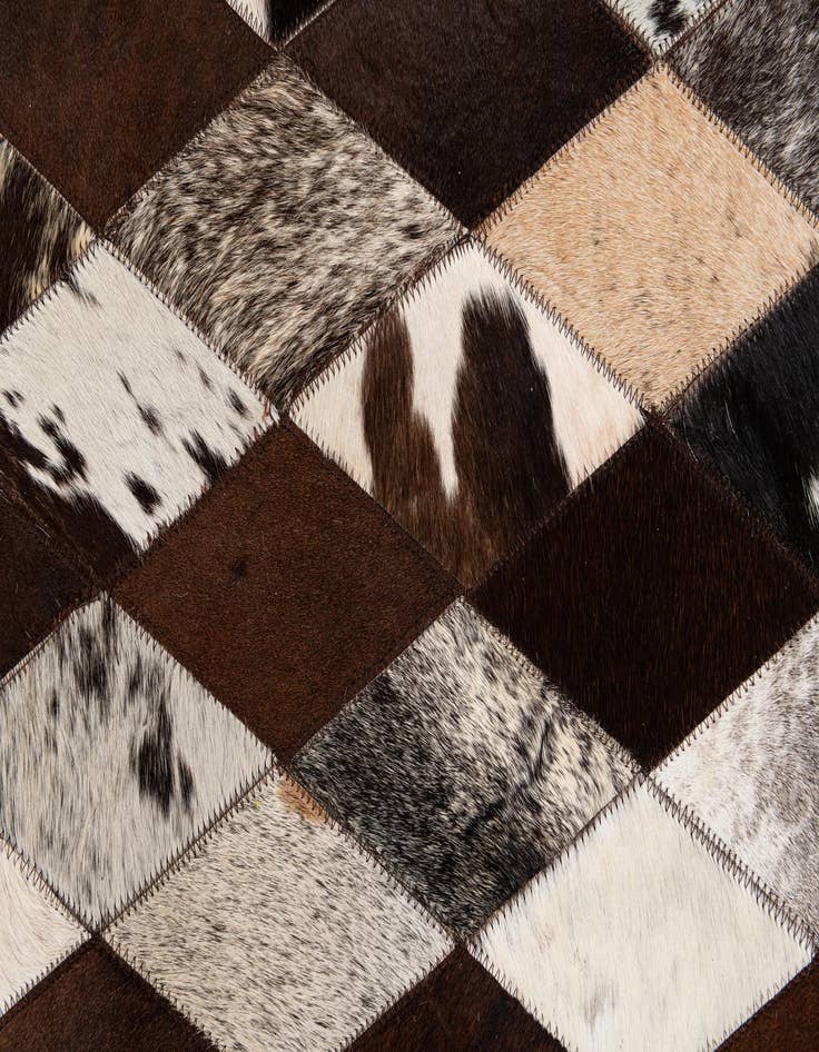 Detail image of  5' 1 x 8' 1 Cowhide Stocks Rug