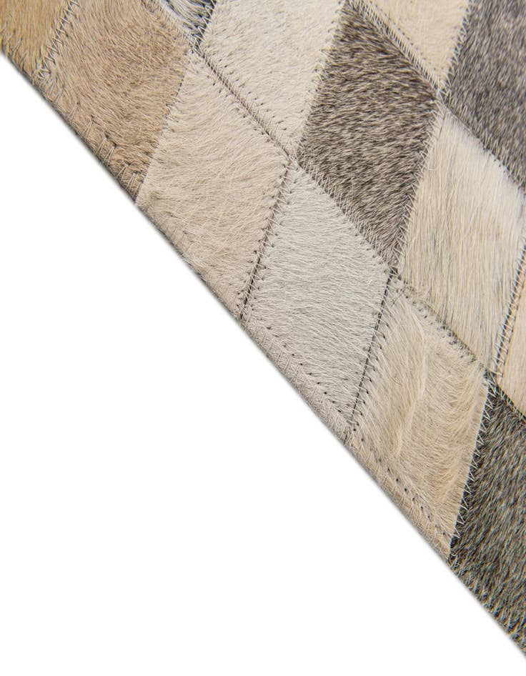 Detail image of  5' 1 x 7' 9 Cowhide Stocks Rug