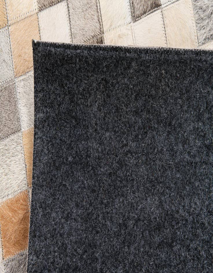 Detail image of  5' 1 x 7' 9 Cowhide Stocks Rug