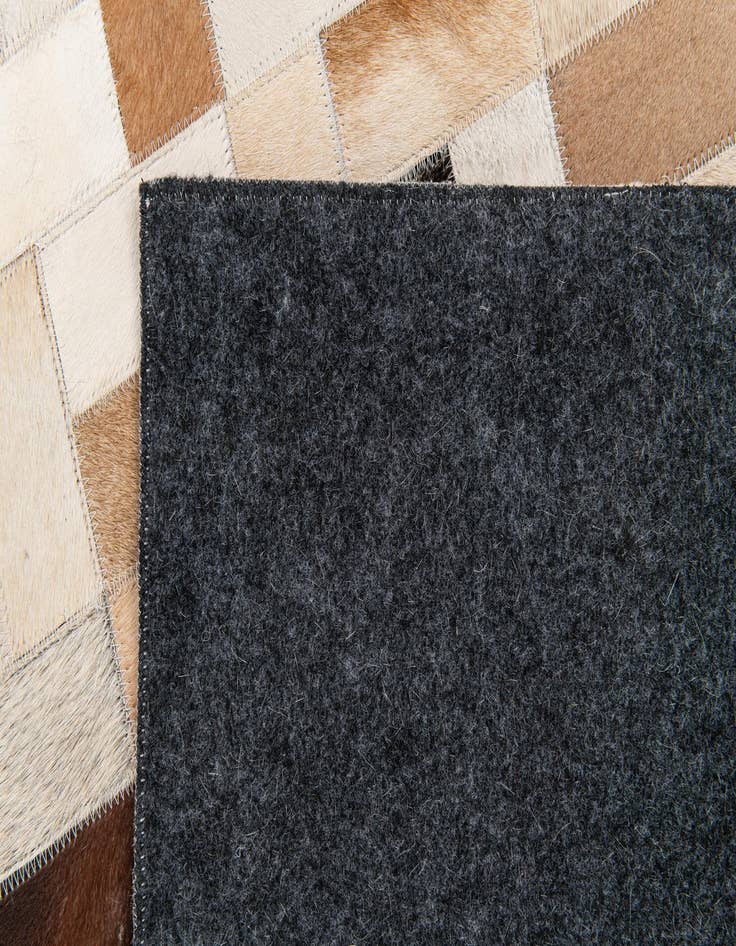 Detail image of  5' 1 x 7' 11 Cowhide Stocks Rug