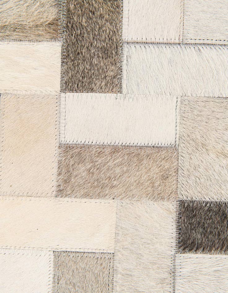 Detail image of  5' x 7' 11 Cowhide Stocks Rug