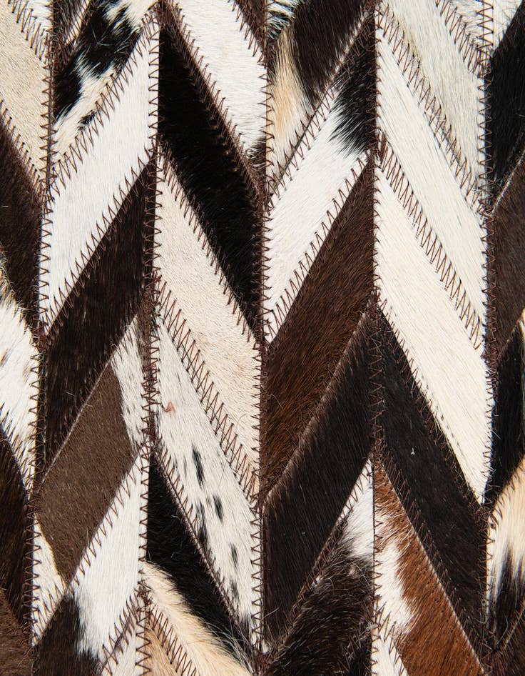 Detail image of  4' 11 x 7' 10 Cowhide Stocks Rug
