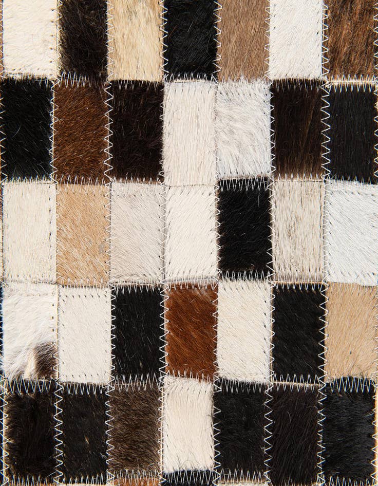 Detail image of  5' 5 x 7' 5 Cowhide Stocks Rug