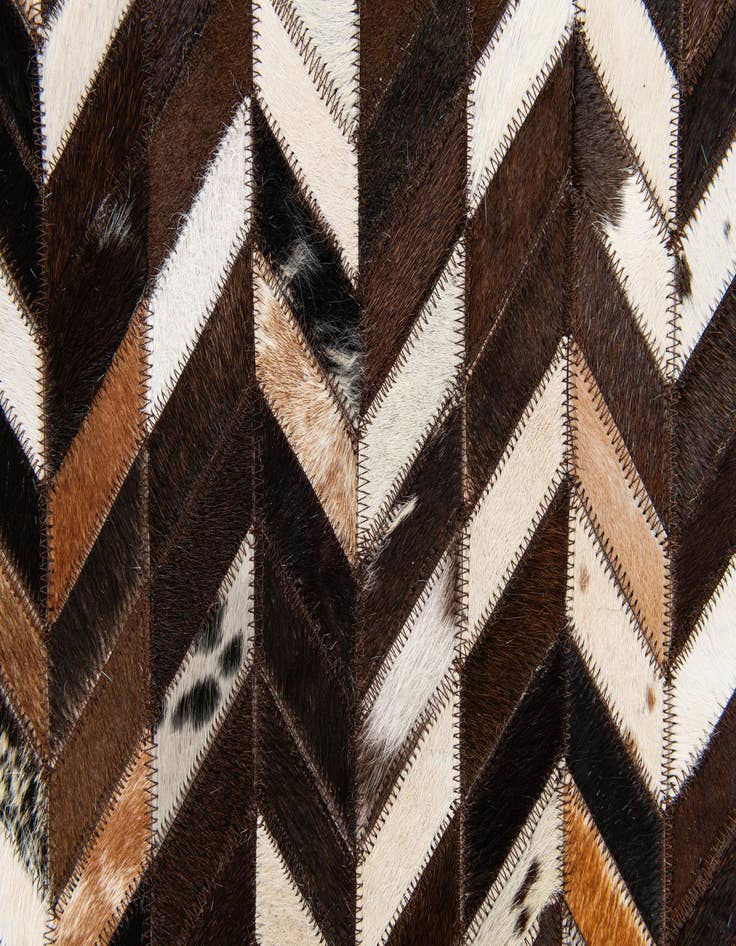 Detail image of  4' 11 x 8' Cowhide Stocks Rug