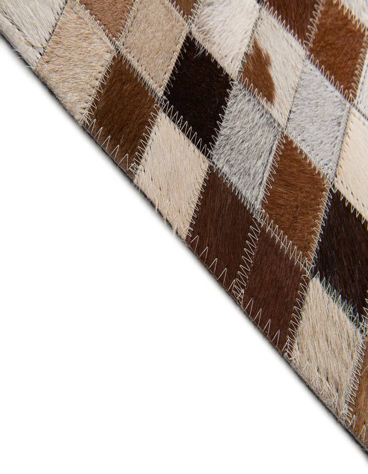 Detail image of  5' x 7' 11 Cowhide Stocks Rug