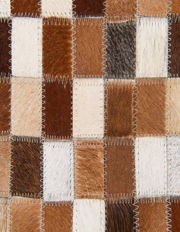 Detail image of  5' x 7' 11 Cowhide Stocks Rug