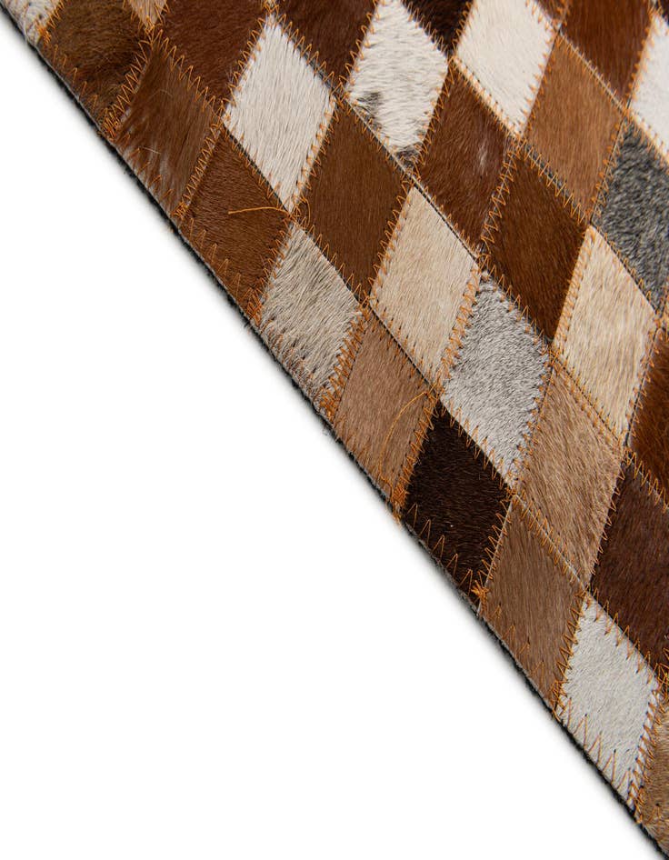 Detail image of  5' 2 x 8' Cowhide Stocks Rug