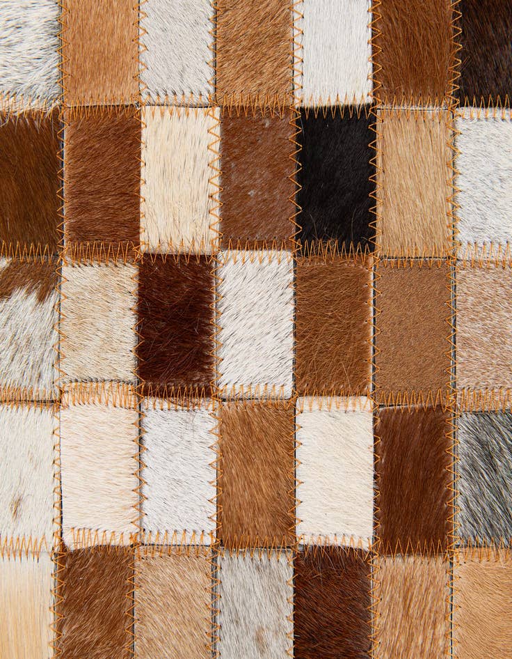 Detail image of  5' 2 x 8' Cowhide Stocks Rug