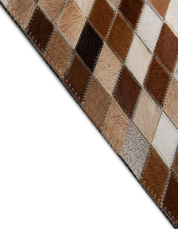 Detail image of  5' x 7' 11 Cowhide Stocks Rug