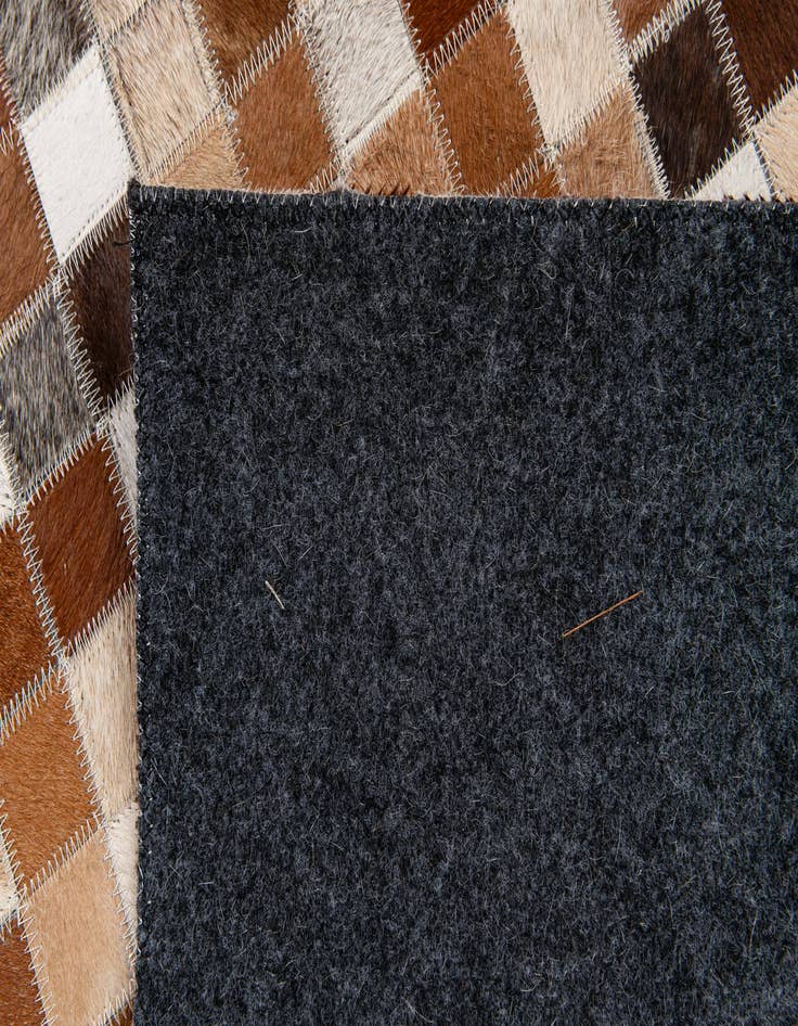 Detail image of  5' 1 x 7' 11 Cowhide Stocks Rug