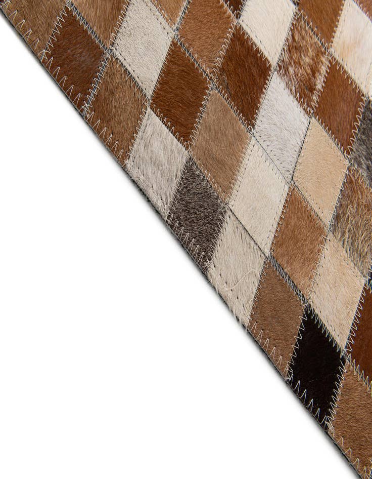 Detail image of  5' 1 x 7' 11 Cowhide Stocks Rug