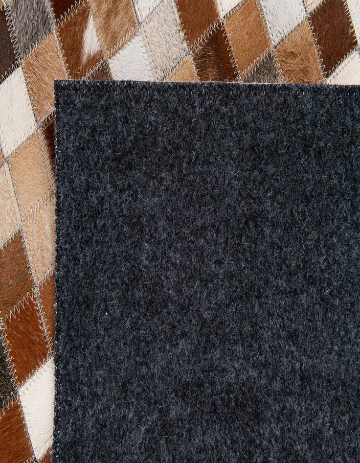 Detail image of  5' 1 x 7' 11 Cowhide Stocks Rug
