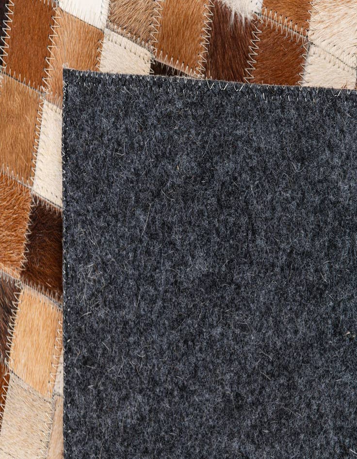 Detail image of  5' 1 x 7' 11 Cowhide Stocks Rug