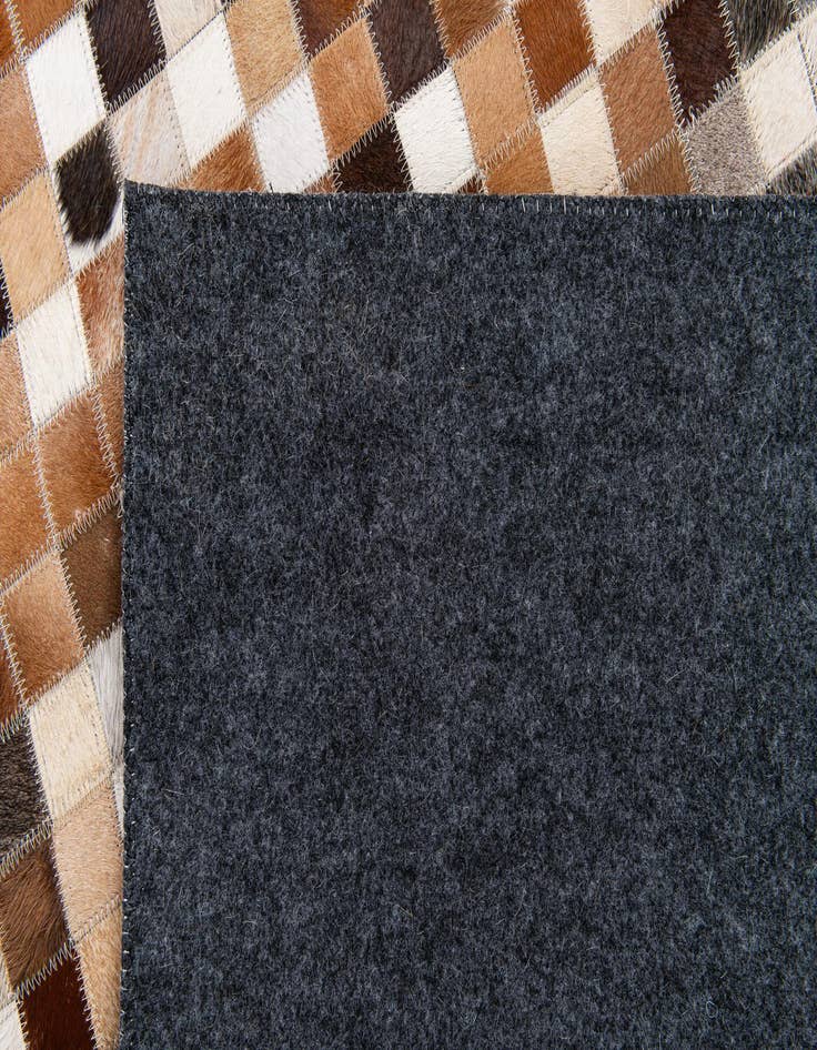 Detail image of  5' 2 x 7' 11 Cowhide Stocks Rug