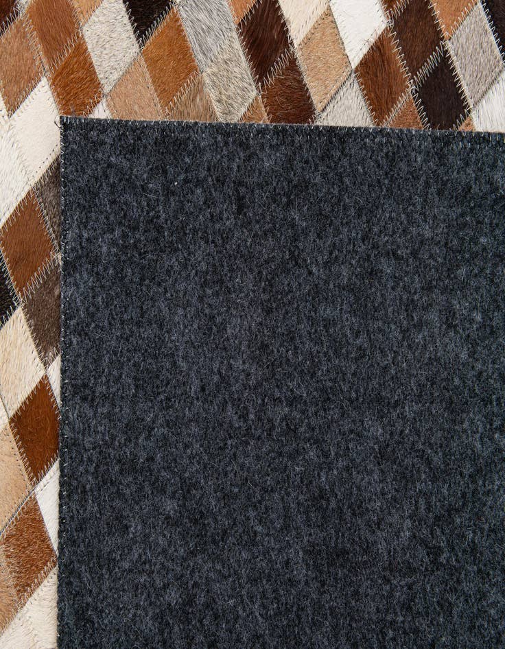 Detail image of  5' 1 x 7' 10 Cowhide Stocks Rug