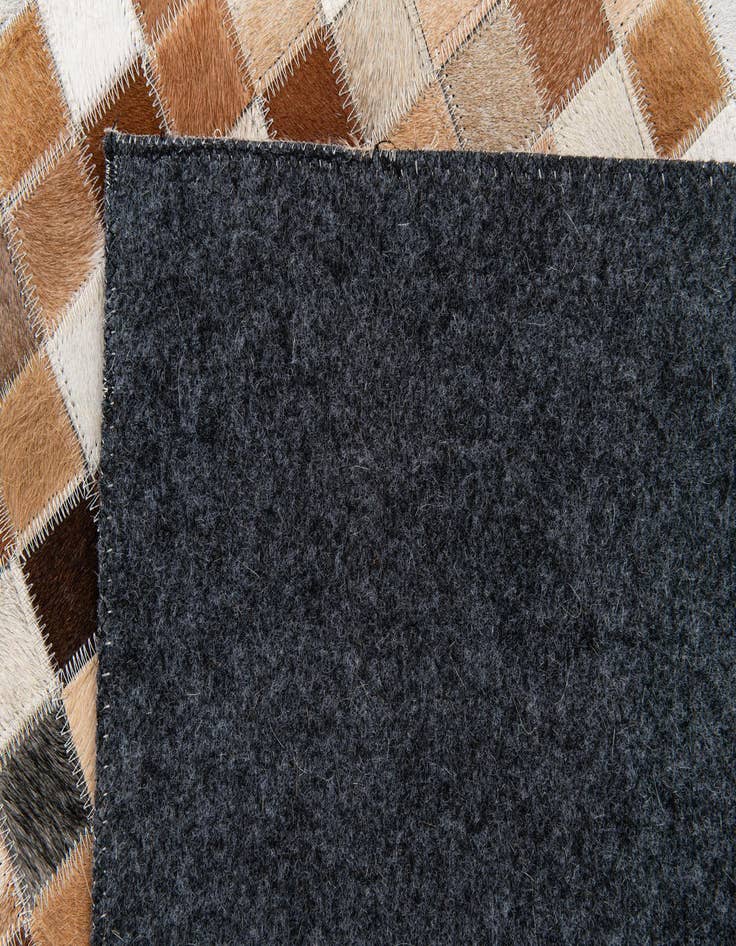 Detail image of  5' x 7' 10 Cowhide Stocks Rug
