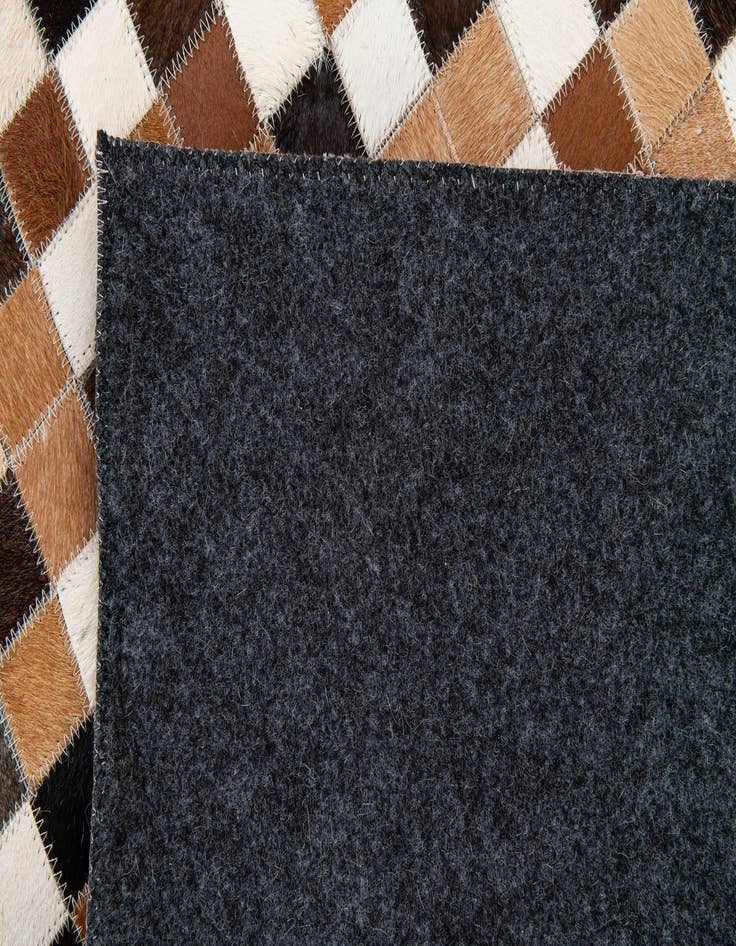 Detail image of  5' 1 x 7' 11 Cowhide Stocks Rug