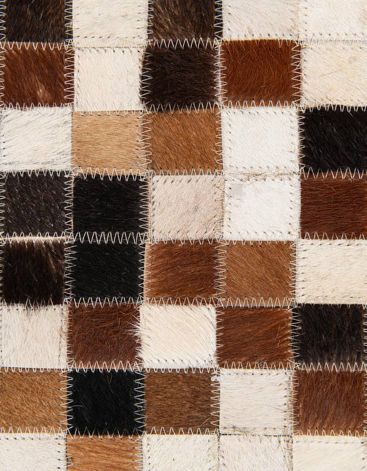 Detail image of  5' 6 x 7' 8 Cowhide Stocks Rug