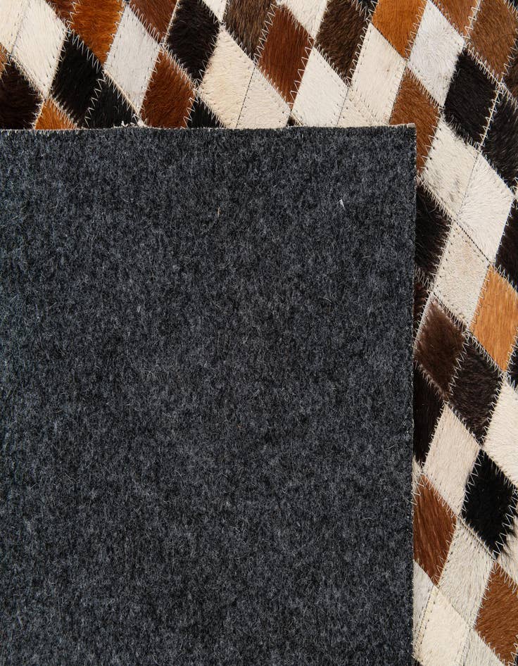 Detail image of  5' 6 x 7' 8 Cowhide Stocks Rug