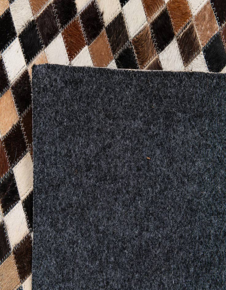 Detail image of  5' 5 x 7' 6 Cowhide Stocks Rug