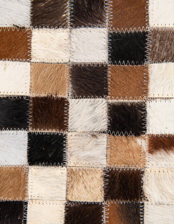 Detail image of  5' 3 x 7' 8 Cowhide Stocks Rug