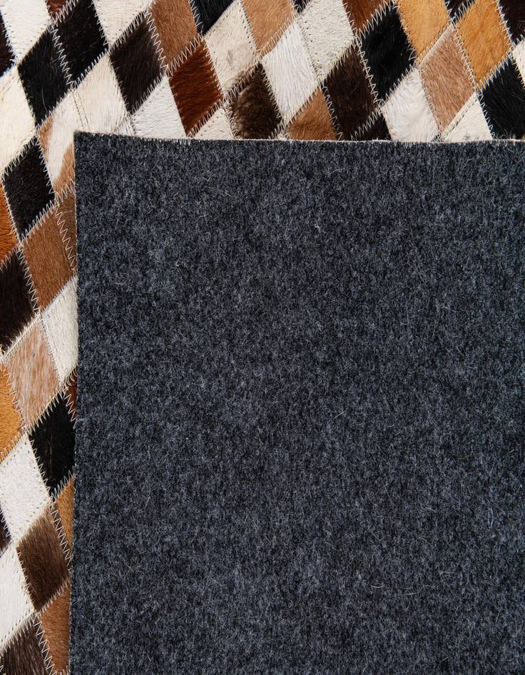 Detail image of  5' 6 x 7' 8 Cowhide Stocks Rug