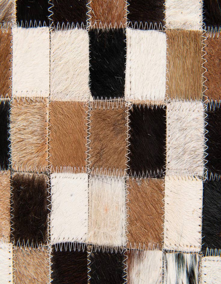 Detail image of  5' 3 x 7' 7 Cowhide Stocks Rug