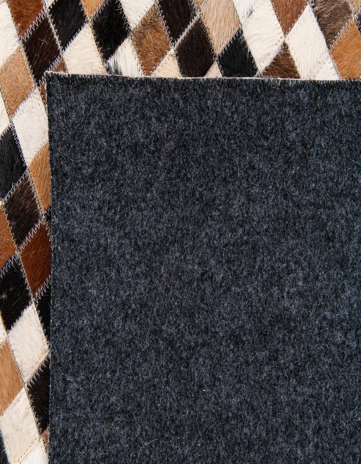 Detail image of  5' 4 x 7' 6 Cowhide Stocks Rug