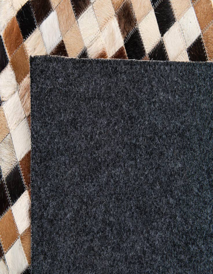 Detail image of  5' 5 x 7' 8 Cowhide Stocks Rug