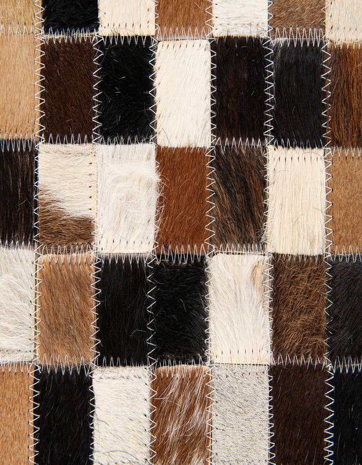 Detail image of  5' 5 x 7' 8 Cowhide Stocks Rug