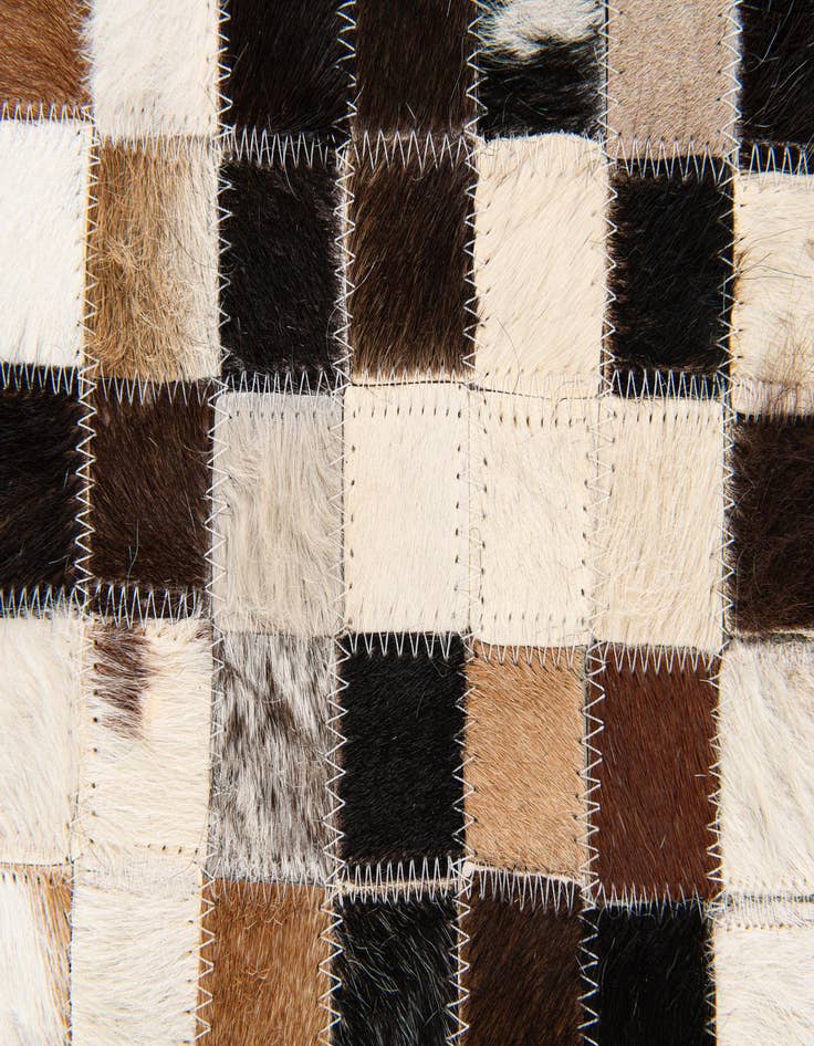 Detail image of  5' 5 x 7' 7 Cowhide Stocks Rug