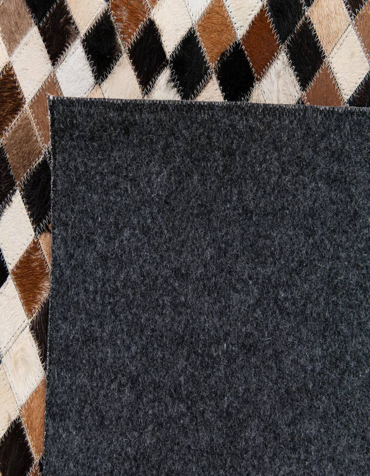 Detail image of  5' 7 x 7' 6 Cowhide Stocks Rug