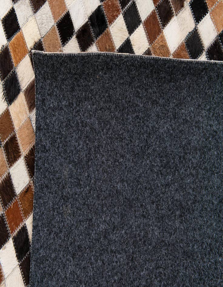 Detail image of  5' 6 x 7' 7 Cowhide Stocks Rug