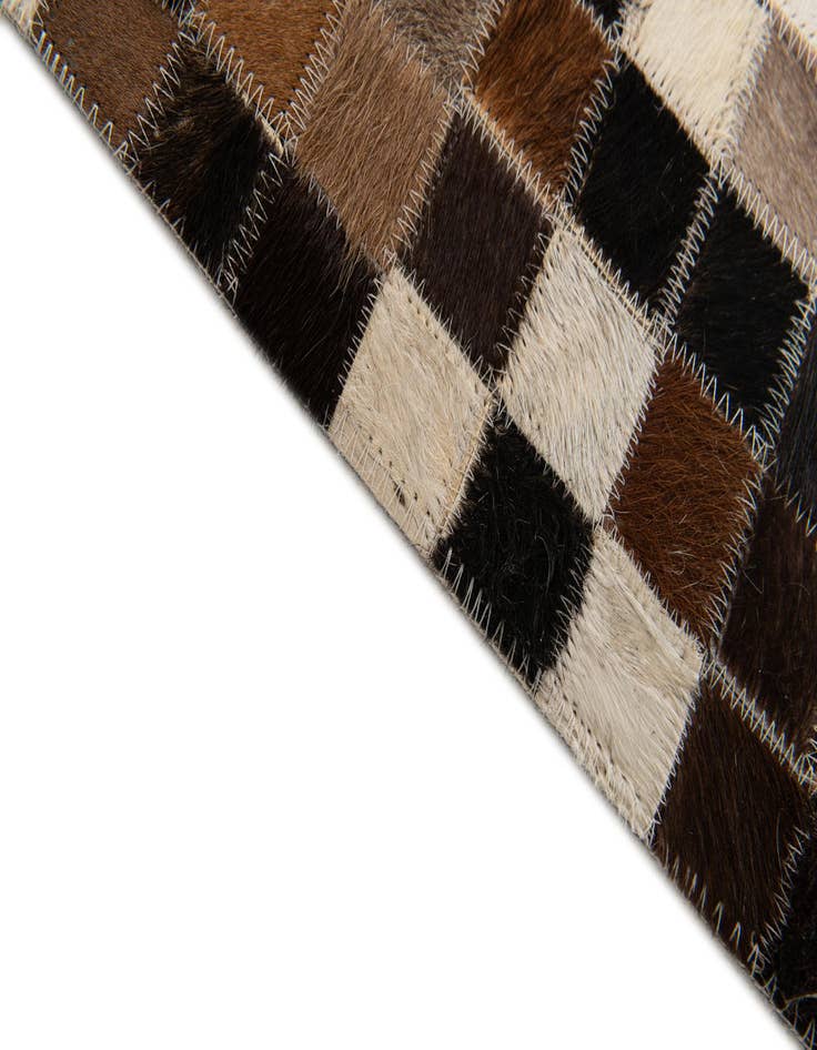 Detail image of  5' 3 x 7' 6 Cowhide Stocks Rug