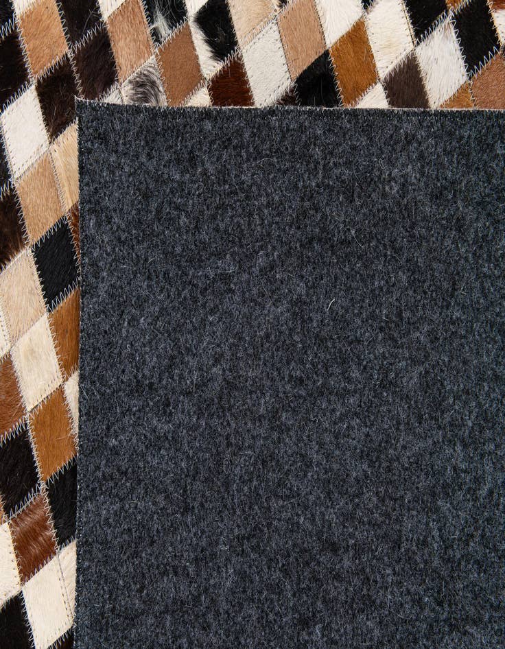 Detail image of  5' 3 x 7' 6 Cowhide Stocks Rug