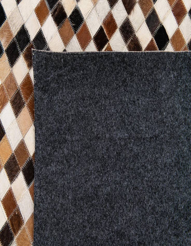 Detail image of  5' 6 x 7' 8 Cowhide Stocks Rug