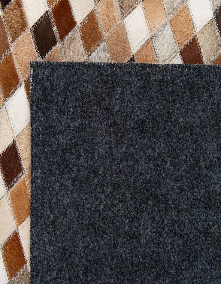 Detail image of  5' x 7' 10 Cowhide Stocks Rug