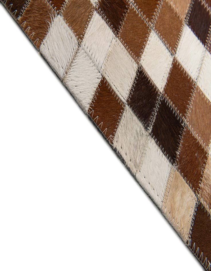 Detail image of  5' x 7' 11 Cowhide Stocks Rug