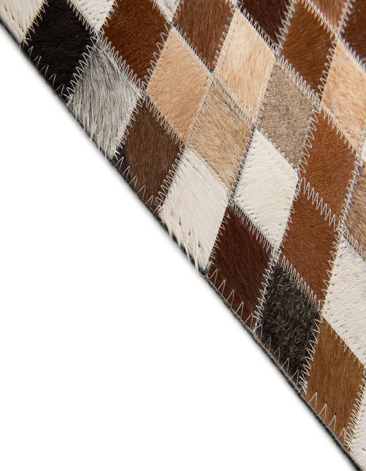 Detail image of  5' x 7' 11 Cowhide Stocks Rug