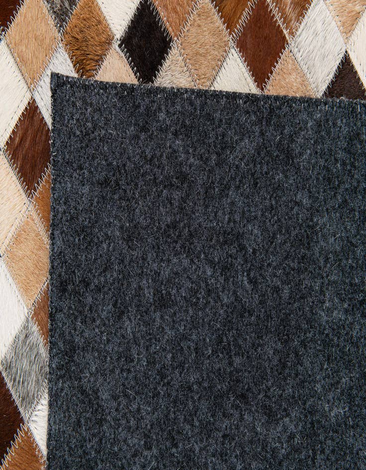 Detail image of  5' x 7' 11 Cowhide Stocks Rug