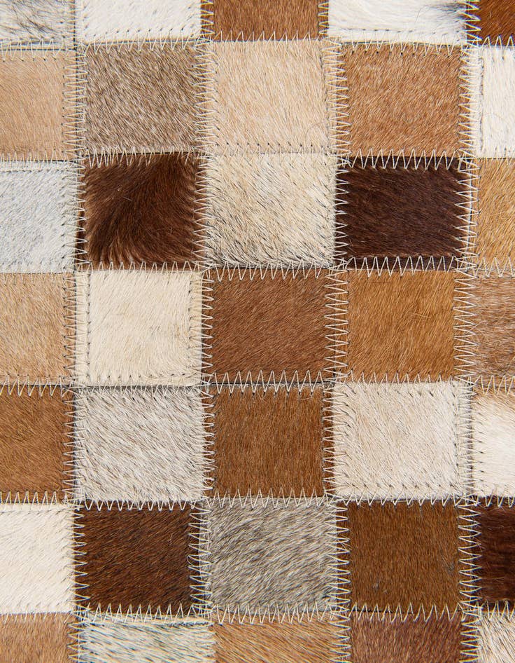 Detail image of  5' x 7' 11 Cowhide Stocks Rug