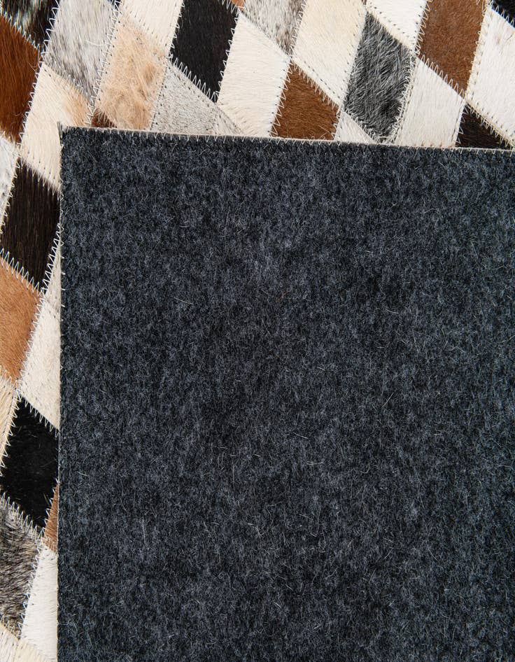 Detail image of  5' x 7' 10 Cowhide Stocks Rug