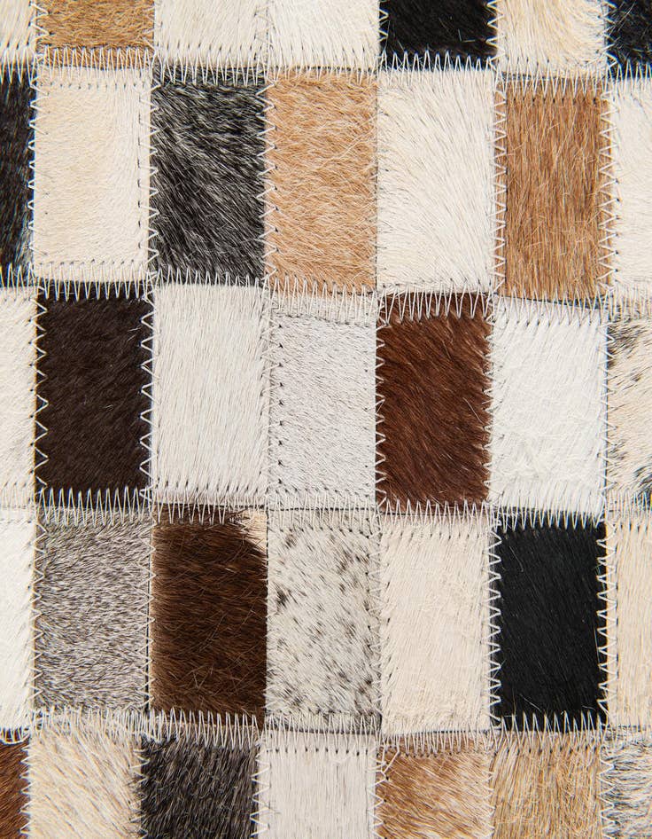 Detail image of  5' x 7' 11 Cowhide Stocks Rug
