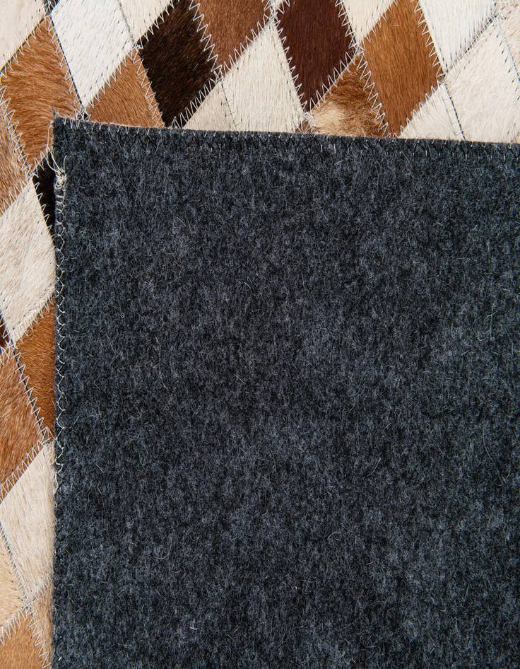 Detail image of  5' 1 x 7' 11 Cowhide Stocks Rug