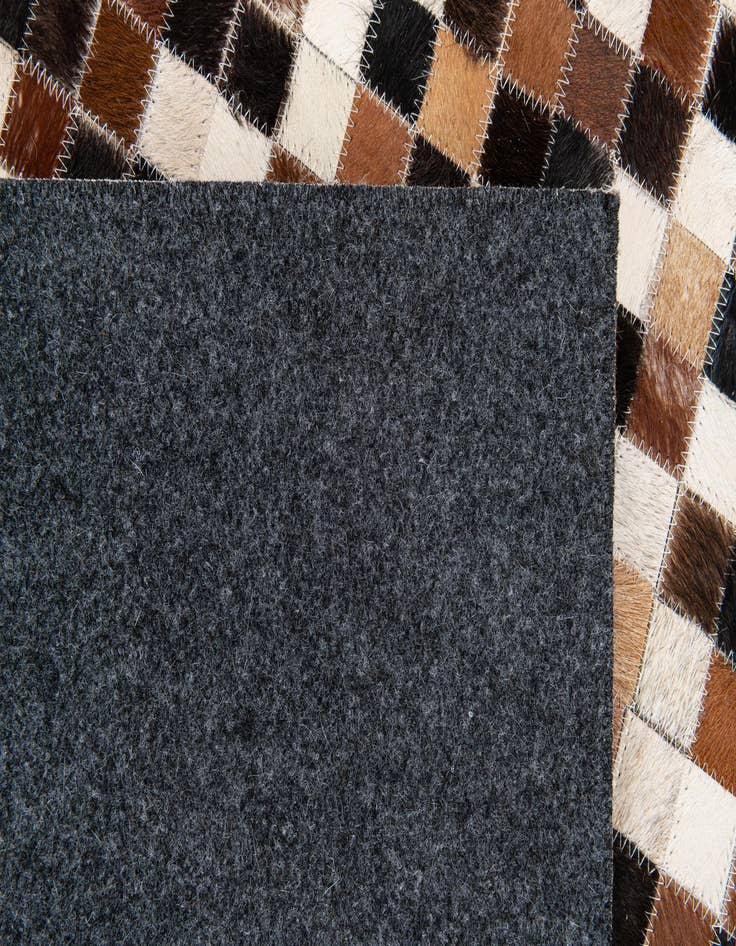 Detail image of  5' 6 x 7' 6 Cowhide Stocks Rug