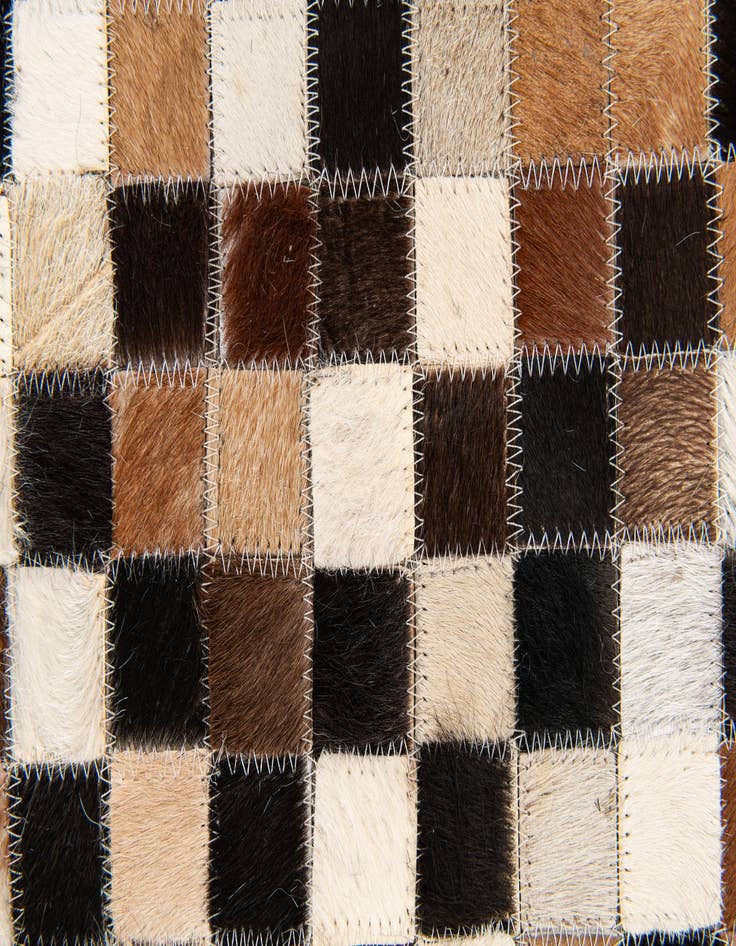 Detail image of  5' 3 x 7' 7 Cowhide Stocks Rug