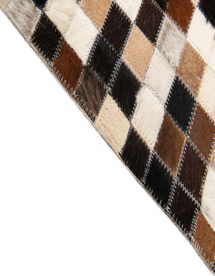 Detail image of  5' 5 x 7' 7 Cowhide Stocks Rug