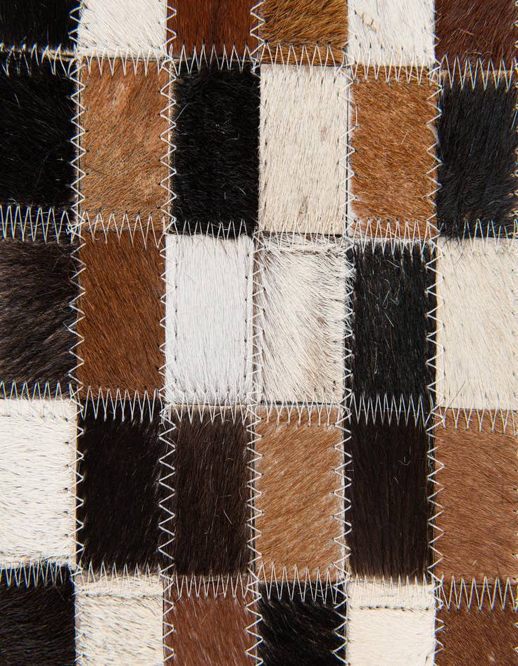 Detail image of  5' 5 x 7' 8 Cowhide Stocks Rug