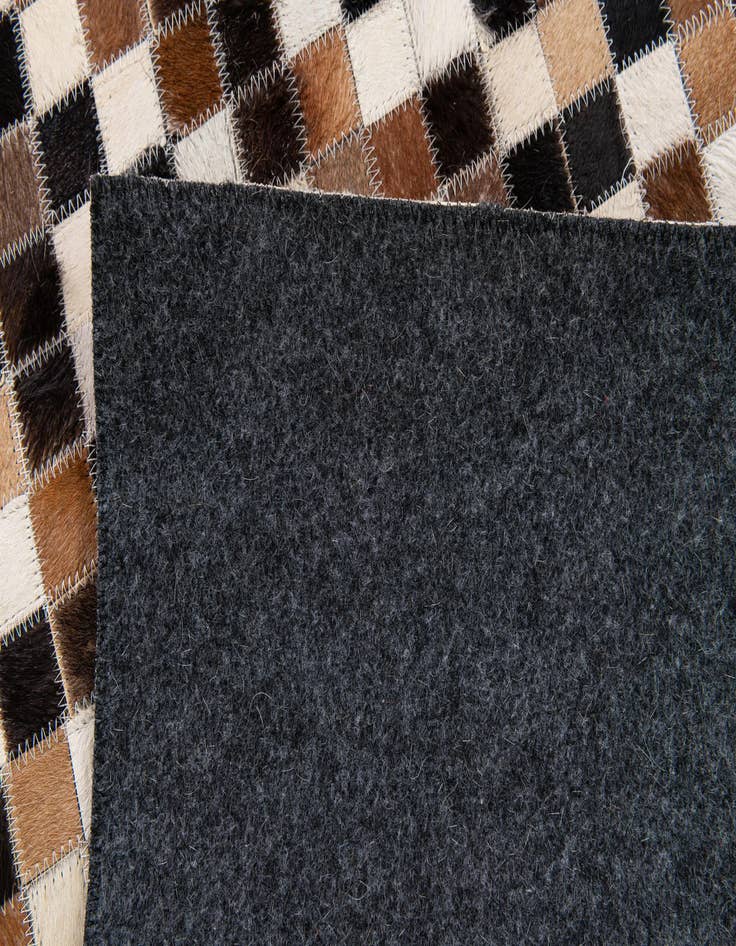 Detail image of  5' 5 x 7' 8 Cowhide Stocks Rug